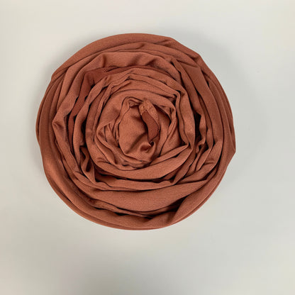 Korean Silk Hijab – Deep Orange Brown | Soft, Lightweight, & Premium Quality